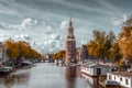 The Montelbaanstoren tower on Oudeschans canal in Amsterdam, Netherlands