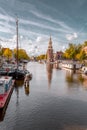 The Montelbaanstoren tower on Oudeschans canal in Amsterdam, Netherlands