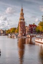 The Montelbaanstoren tower on Oudeschans canal in Amsterdam, Netherlands