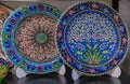 ÃÂ¤Montenegrin hand painted decorative plates with a floral pattern in at a souvenir shop in Kotor old town in Montenegro