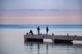 10.10.2019 Montenegro Budva Fishermen on the pier in the early morning. Royalty Free Stock Photo