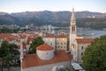 Montenegro - Budva: September 6, 2021: Aerial view of old town of Budva, Adriatic sea and mountains. View of walled city