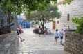 Montenegro - Budva: September 8, 2021: Old town of Budva with souvenirs next to Church of Holy Trinity. Heritage site