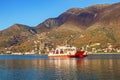 Montenegro. Ferryboat runs across Verige Strait, Kotor Bay