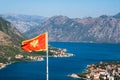 Montenegro flag at Kotor bay. Balkans, Adriatic sea, Europe