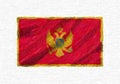 Montenegro hand painted waving national flag.