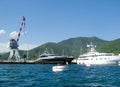 Montenegro, June 2011: View from the water at the mooring place of private yachts off the Montenegro coast. On parking are black,