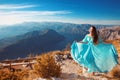 Montenegro landscape above Kotor bay. Beautiful woman in blowing