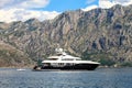 Montenegro. Large white yacht sails in the Bay of Kotor near the town of Herceg Novi