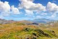 Montenegro, national park Durmitor, mountains and clouds panorama. Shepherd and flock of sheep. Sunlight lanscape. Nature travel