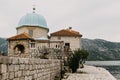 Montenegro. Perast. 16.05.2020 Boka island Church of Our Lady of the Rocks Kotor Bay Royalty Free Stock Photo