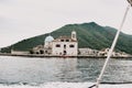 Montenegro. Perast. 16.05.2020 Boka island Church of Our Lady of the Rocks Kotor Bay. View from the boat Royalty Free Stock Photo