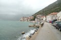 Montenegro port, wavy sea and misty weather. coastline Royalty Free Stock Photo