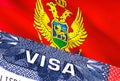 Montenegro Visa Document, with Montenegro flag in background. Montenegro flag with Close up text VISA on USA visa stamp in Royalty Free Stock Photo
