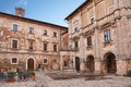 Montepulciano, Siena, Tuscany, Italy: corner of the main square Piazza Grande with the ancient Griffin and Lion Well 1520