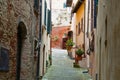 Montepuliciano old city characteristic medieval narrow street, Tuscany, Italy