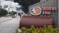 Monterey, California, Cannery Row road sign, tourist landmark. Bay aquarium. Royalty Free Stock Photo