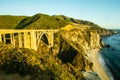 A landscape sunset view of the Bixby Creek Bridge along the Big Sur coast of California Royalty Free Stock Photo