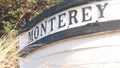 Monterey sign on boat stern, fisherman vessel near Cannery Row and Bay Aquarium. Royalty Free Stock Photo