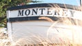 Monterey sign on boat stern, fisherman vessel near Cannery Row and Bay Aquarium. Royalty Free Stock Photo