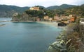 View across bay at Monterosso and its brightly painted buildings Cinque Terre Liguria Italy