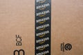 Monterrey, Mexico - Sept 3,0 2019: Amazon standard shipping box. Amazon logotype printed on cardboard box security scotch tape.
