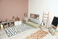 Montessori bedroom interior with floor bed Royalty Free Stock Photo