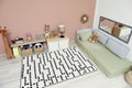 Montessori bedroom with floor bed and toys Royalty Free Stock Photo