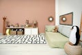 Montessori bedroom interior with floor bed and toys Royalty Free Stock Photo