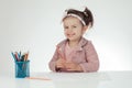 Cute little girl learn to draw. Education. School. Montessori.