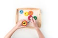 Montessori material. Hand of a child