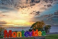 Montevideo sign and panoramic view from Fortaleza General Artigas with a beautiful sunset sky, Montevideo, Uruguay Royalty Free Stock Photo