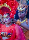 Candombe vedette arranging the hair of a partner, calls parade, montevideo, uruguay Royalty Free Stock Photo