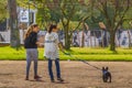 Girls with Pet Walking at Park Royalty Free Stock Photo