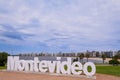 Montevideo written in giant letters at the eastern city access, the skyline in the background, Montevideo, Uruguay