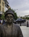 Portrait of Rosa Parks statue with statehouse in background