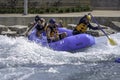 Couple and guide rafting at Montgomery Whitewater