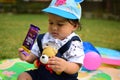 9 Month Baby Boy Outdoors in Summer - stock photo, Cute Boy playing in the park, Sweet Little baby boy enjoying