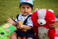 9 Month Baby Boy Outdoors in Summer - stock photo, Cute Boy playing in the park, Sweet Little baby boy enjoying Royalty Free Stock Photo