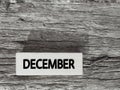 month of December on wooden blocks