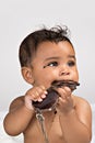 7 month old chewing on sunglasses Royalty Free Stock Photo