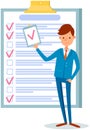 Month scheduling, to do list, time management. Businessman stands near checklist and planning