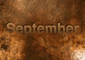 Month of September text type written on gravel