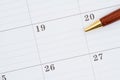 Monthly calendar with a pen Royalty Free Stock Photo