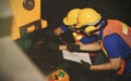 The technicians work as a team to inspect the use of hydraulic machines in the factory. Royalty Free Stock Photo