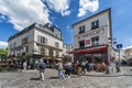 Street life in Montmartre district, Paris. Royalty Free Stock Photo