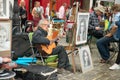 Montmartre Paris, painter at the place du tertre, tourism attraction in France,  artists drawing portraits,Paris 04.08.2017 Royalty Free Stock Photo