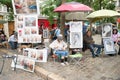 Montmartre Paris, painter at the place du tertre, tourism attraction in France,  artists drawing portraits,Paris 04.08.2017 Royalty Free Stock Photo