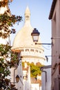 Montmartre Sacre Coeur Cathedral, narrow street Paris