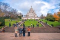 Montmartre shopping district and Sacre Coeur cathedral with tourists